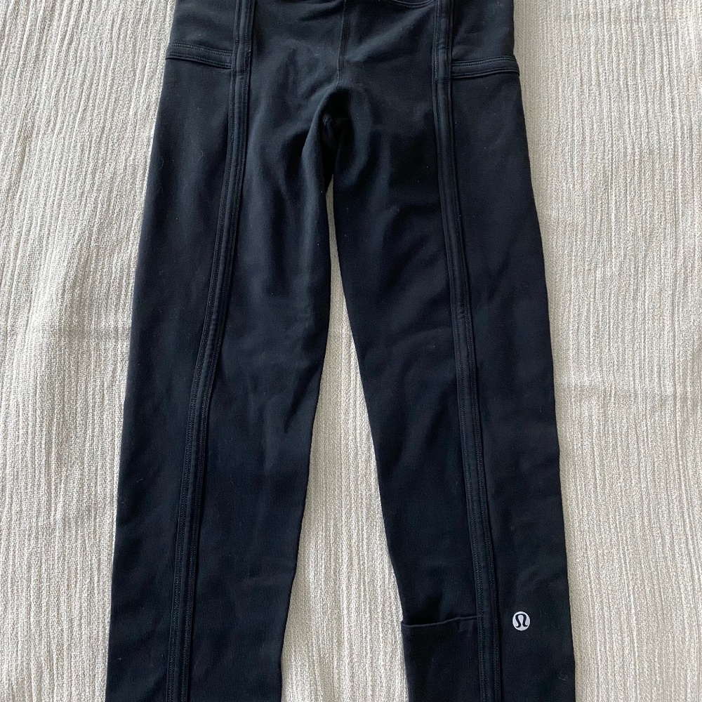 Lululemon Black Leggings Size 2, pocket at left lower leg